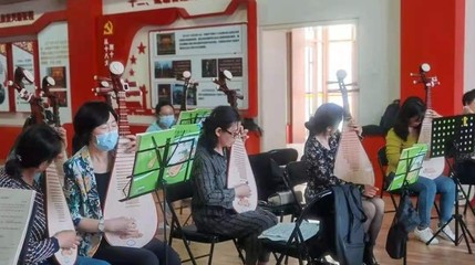 一揉玉弦萬般情，彈支紅曲給黨聽 文化藝術交流的深情頌歌